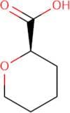 (2R)-Oxane-2-carboxylic acid