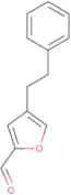 4-(2-Phenylethyl)furan-2-carbaldehyde