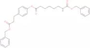 Benzyl 3-(4-(N-benzyloxycarbonxyl-6-aminocaproyloxy)phenyl)propionate